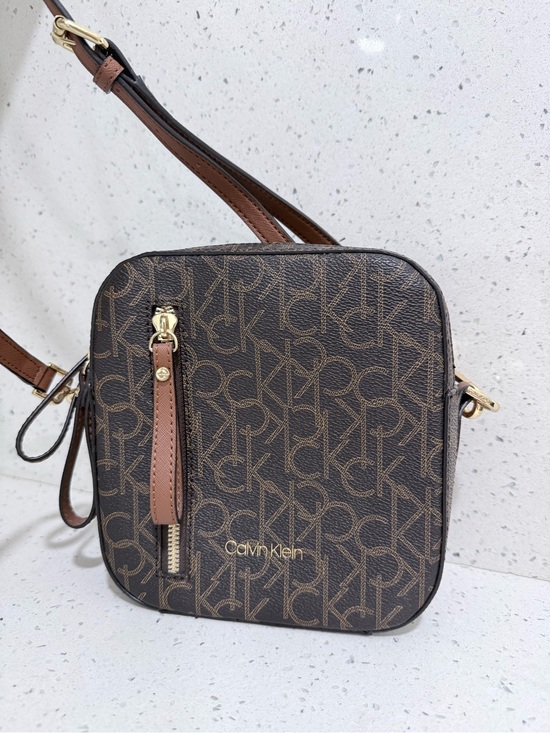 Calvin Klein Handbags - Calvin Klein Brown Monogram Square Crossbody with Tan Strap